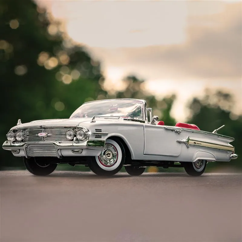 1960 Chevy Impala die-cast model with detailed chassis and separate exhaust system

